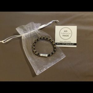 Gold, Black and Silver Roll-on Bracelet